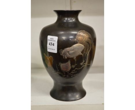 A good Japanese bronze, silver and copper vase.