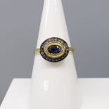Oval Sapphire & Diamond Halo Ring