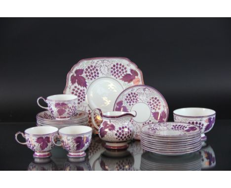 A Grays Pottery part tea service circa 1930 each piece decorated in pink lustre with vines and grape leaves comprising, ten t