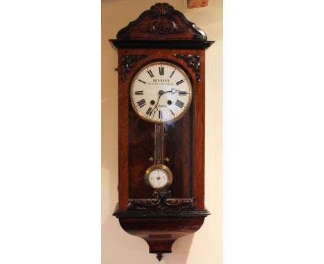 A late 19th century walnut rectangular clock, enamel Roman numeral dial signed BENNETT 64 of 65 Cheapside, movement striking 