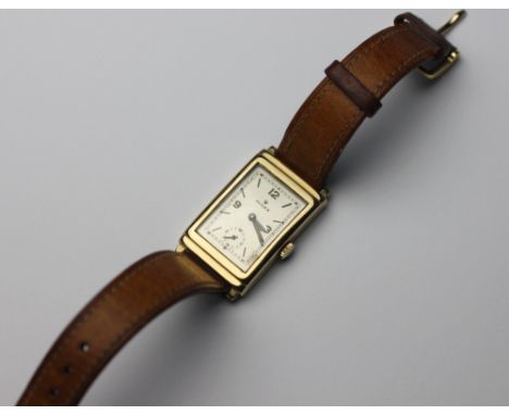 A Gentleman's 9ct gold Rolex Tank type wrist watch, Arabic and baton dual with button marked T, the case stamped ROLEX 25 Wor