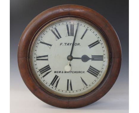 A 19th century twin face station clock formerly from Wem Town Hall Shropshire, by each 40cm Roman numeral dial signed F. Tayl