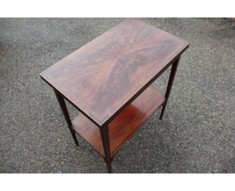 An Edwardian inlaid mahogany folding card table, with undertier on tapered legs, 76cm H x 66cm W x 40cm D