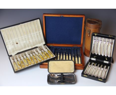 A silver christening spoon and fork, Sheffield 1943, twelve Art Deco dessert forks, a cased set of twelve pairs of fish eater