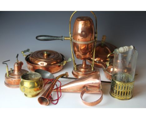 A collection of copper and brass wares, to include an ale warmer, a coaching horn and a pierced storm light (Qty)