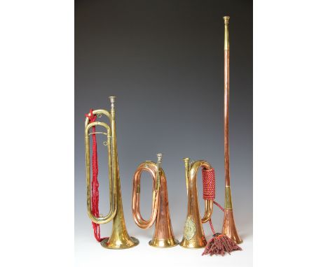 An Argyle and Sutherland copper and brass bugle, 28cm, with two other bugles and a coaching horn (4)