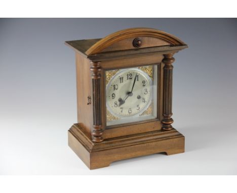 A walnut and beech bracket clock, Arabic dial with movement striking on a gong, 34cm
