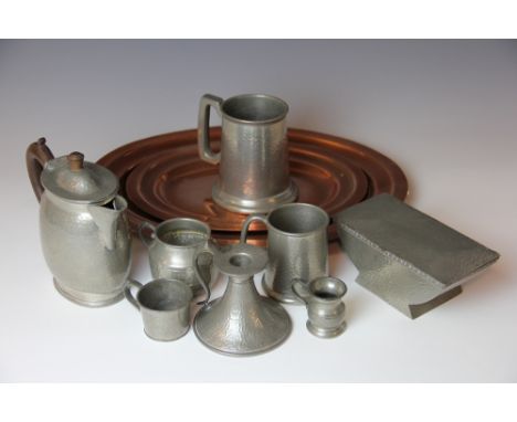 A Craftsman Pewters hammered pewter box, an Abbey Pewter chamber stick, a hot water pot, five other pewter items and two copp