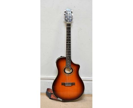 LINE 6; a Variax 700 acoustic guitar, cased.  Provenance: From the collection of Gerry RobinsonGerry Robinson was a founding 