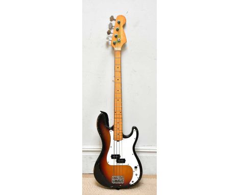An unnamed four string P style bass guitar.Condition Report: Untested we do not guarantee full working order on electrics.