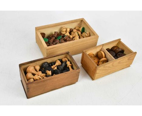 Two complete chess sets and a complete rosewood and fruitwood draughts set (3).