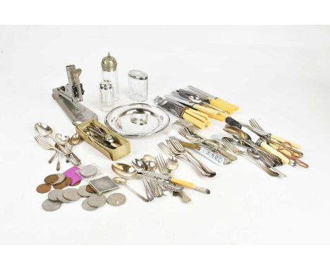 A collection of plated cutlery including knives, forks and spoons, also a small collection of commemorative crowns, a plated 