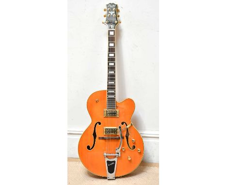 PEERLESS; a Tonemaster Player hollow body electic guitar, serial number PE0903276, cased.  Provenance: From the collection of