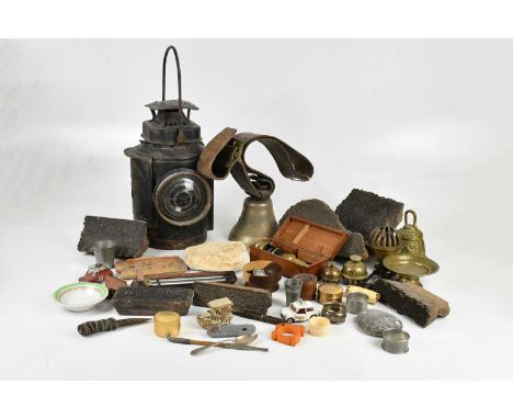 An assortment of collectors' items, including hallmarked silver teaspoon, napkin ring, printing blocks, a Victorian corkscrew