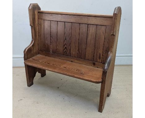 A Victorian pitch pine pew, width 110cm.