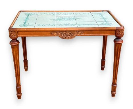 A French style walnut framed tea table of rounded rectangular form, the top inset with fifteen tiles signed 'Tor Karlsson Ups