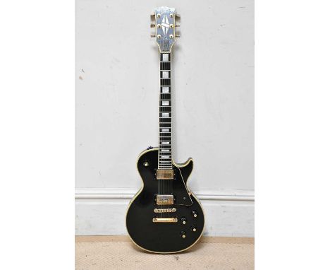 GIBSON; a 1974 Les Paul Custom, serial no. 184669, with chainsaw case.Condition Report: Untested we do not guarantee full wor