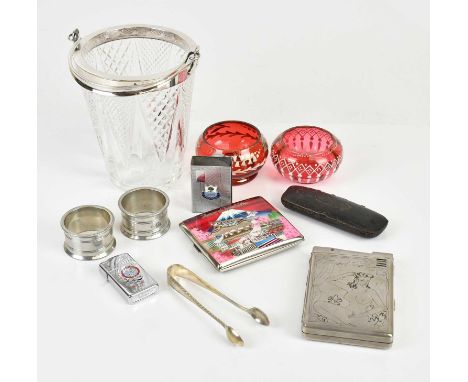 A small collectors' lot comprising a Zippo USS Okinawa lighter, a Memory of Japan two-in-one cigarette case and lighter, a Me