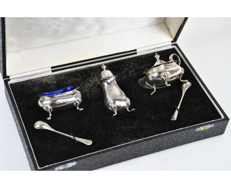ADIE BROTHERS; a hallmarked silver three piece cruet, Birmingham 1947, weight 3ozt / 104g, cased.