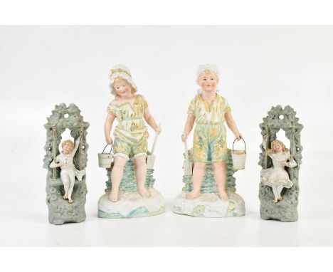 GOSS &amp; COMPANY; a pair of painted Parian ware figures, representing a boy and girl at the beach with buckets and spades, 
