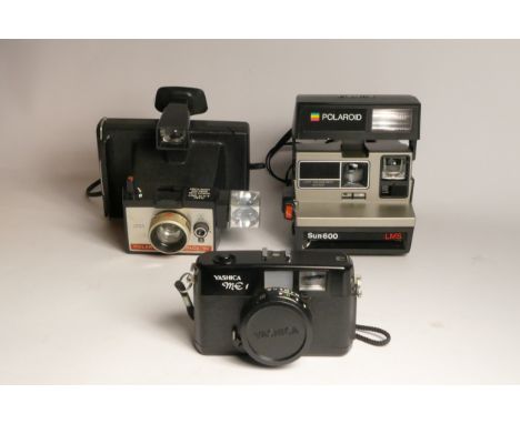 A Yashica ME1 35mm film camera, with a 38mm f2.8 lens, a Polaroid Colorpack 80, manual, flash bulb and original box, together