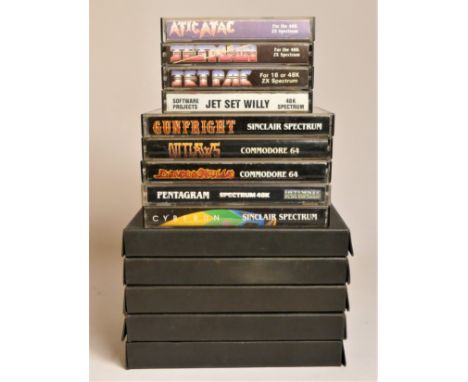 A collection of fourteen Ultimate Play The Game Cassette Games for the Commodore 64 and Spectrum 48K, to include :Gunfight, c