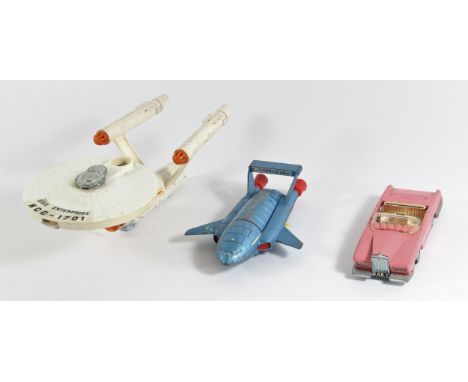 A Dinky Star trek U.S.S Enterprise, licensed from Paramount TV 1976, with original decals, together with two Dinky Thunderbir