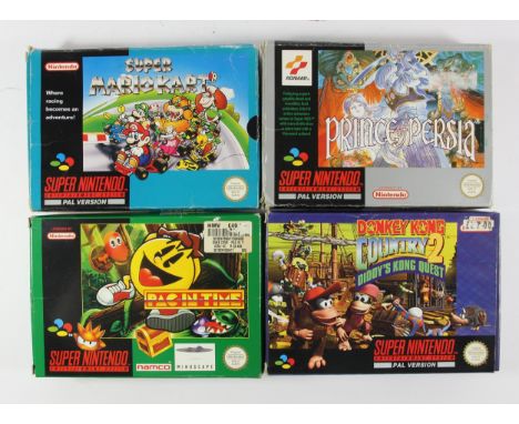 Four Super Nintendo Games, to include Donkey Kong Country 2 (original box, card insert and manual)Super Mario Kart (original 