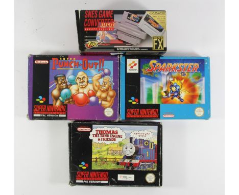 Three Super Nintendo Games, to includeSuper Punch Out (original box, card insert and manual)Thomas The Tank Engine & Friends 