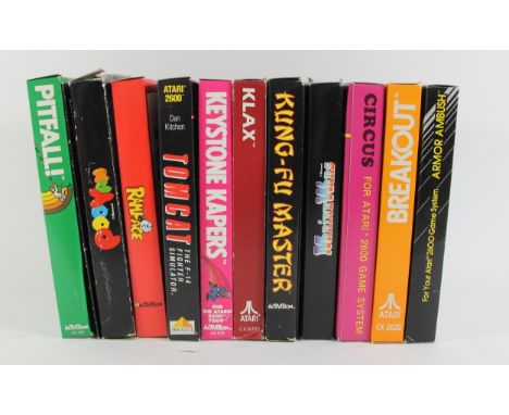 A collection of eleven boxed Atari 2600 cartridge games, to include :Armour Ambush (original box, card insert and manual)Brea
