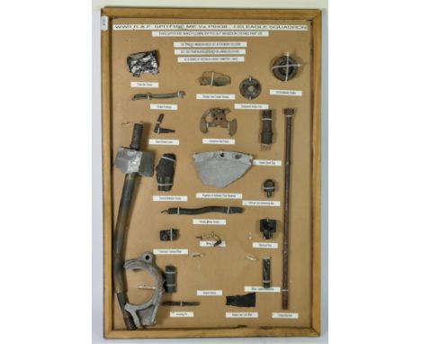 WWII Spitfire Mk Va memorabilia, mounted on a board, stating that the bits were collected from a crash site.WWII RAF Spitfire