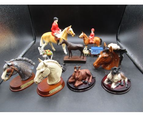 Assorted horse figurines, most ceramic,&nbsp; one leather? stamped, one coal, a die cast horse and carriage and souvenir mule