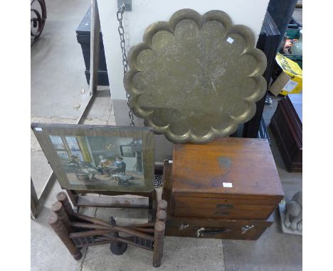 An eastern brass topped folding occasional table, two oak boxes and a firescreen 