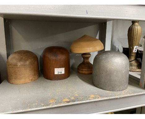 Four vintage millinery/hat blocks