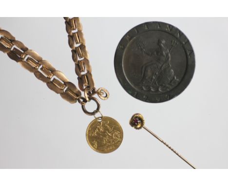 A gold Edward VII half sovereign dated 1906, pierced and suspended from a yellow metal bracelet, along with a stick pin stamp