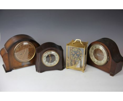 An Art Deco Smiths Enfield bakelite mantel clock, another Smith Enfield oak cased matel clock, a Kundo skeleton clock with en