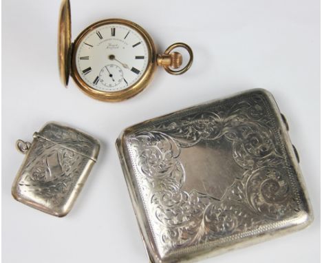 An engraved silver cigarette case, Birmingham 1920, 9cm, a Victorian silver vesta case, 4g and a gold plated pocket watch ret