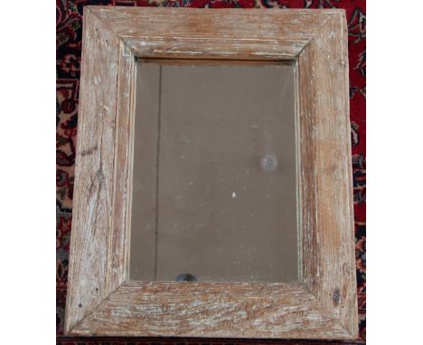 A modern rustic pine wall mirror, 64cm x 53cm, with another pine wall mirror, 89cm x 50cm (2)