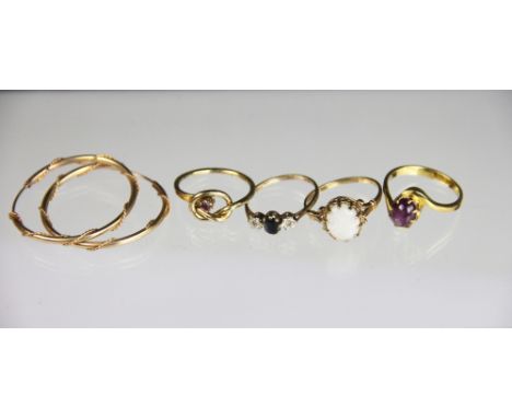 A collection of jewellery, to include; a star ruby ring set in yellow metal, indistinctly stamped, weight 3.3gms, an opal rin