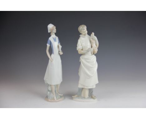 Two Lladro figures, to include; Obstetrician H-25 S 36.5cm high and Nurse 4603 37cm high (2) 