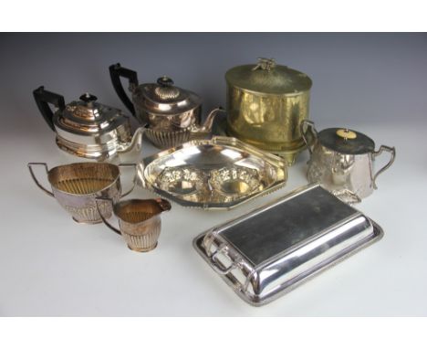 A Victorian silver plated biscuit box, of oval form with bird finial, with a silver plated entree dish and cover, a set of tw