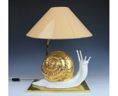 A pair of novelty ceramic lamps modelled as snails, on brass rectangular bases, with a modern figural basket etc (4)