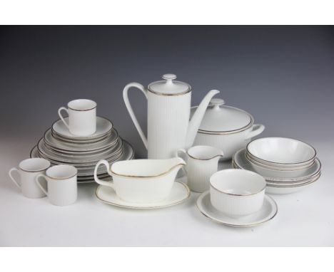 An Arzberg German porcelain dinner service, each piece with gilt lined decoration, to include; three, two handled tureens and