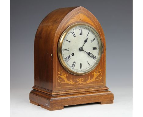 An Edwardian inlaid mahogany lancet shape mantle clock, with movement striking on two gongs, 29cm 