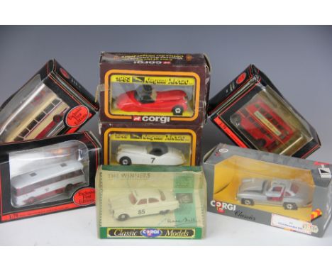 A collection of Exclusive First Editions die cast model vehicles, with an assortment of Corgi die cast models in brown boxes 