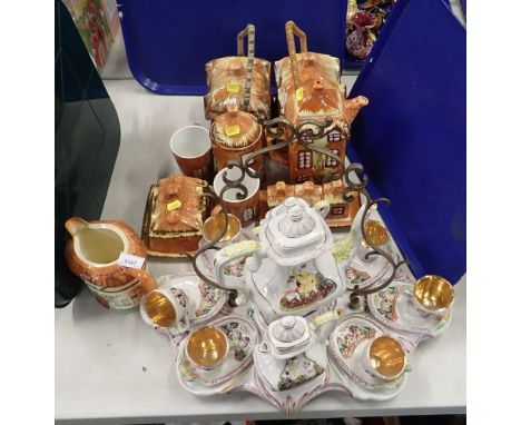 A Capodimonte coffee set, comprising coffee pot, twin handled lidded sugar bowl, milk jug, and six cups and saucers, on a sta