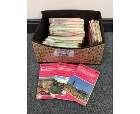 A box containing a quantity of ordnance survey maps
