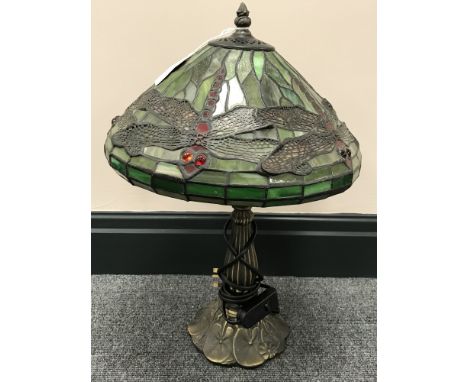 A Tiffany style table lamp and shade with dragonfly decoration