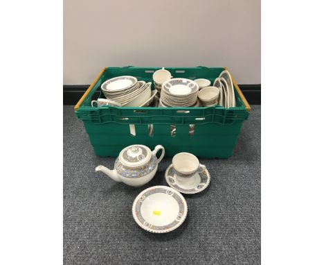 A box containing Johnson Brothers Old English tea and dinner service