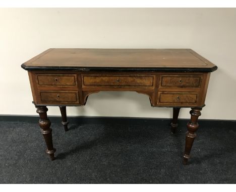 A continental inlaid walnut desk fitted five drawers 